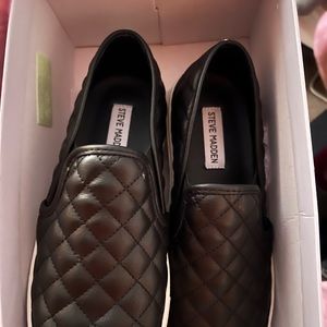 Steve Madden Black eccentric slip on. New in box. Size 8.5.